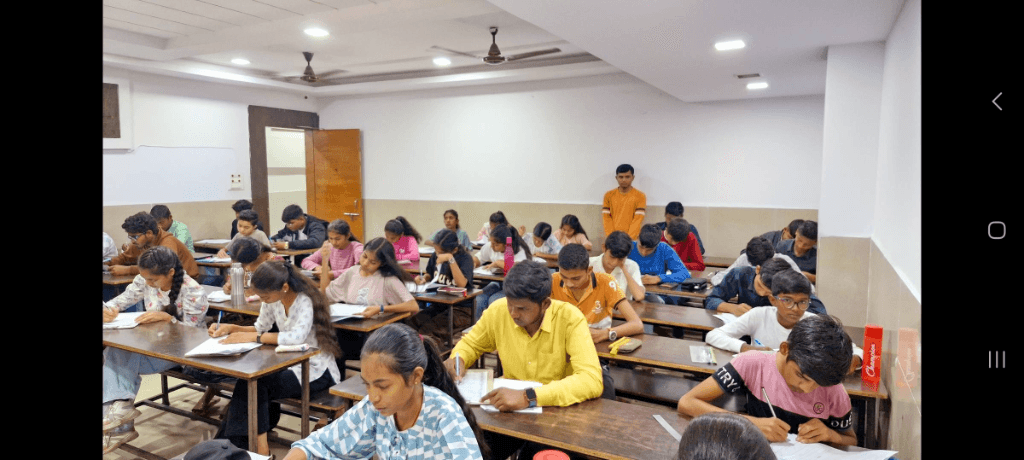 Teacher guiding students during exam preparation